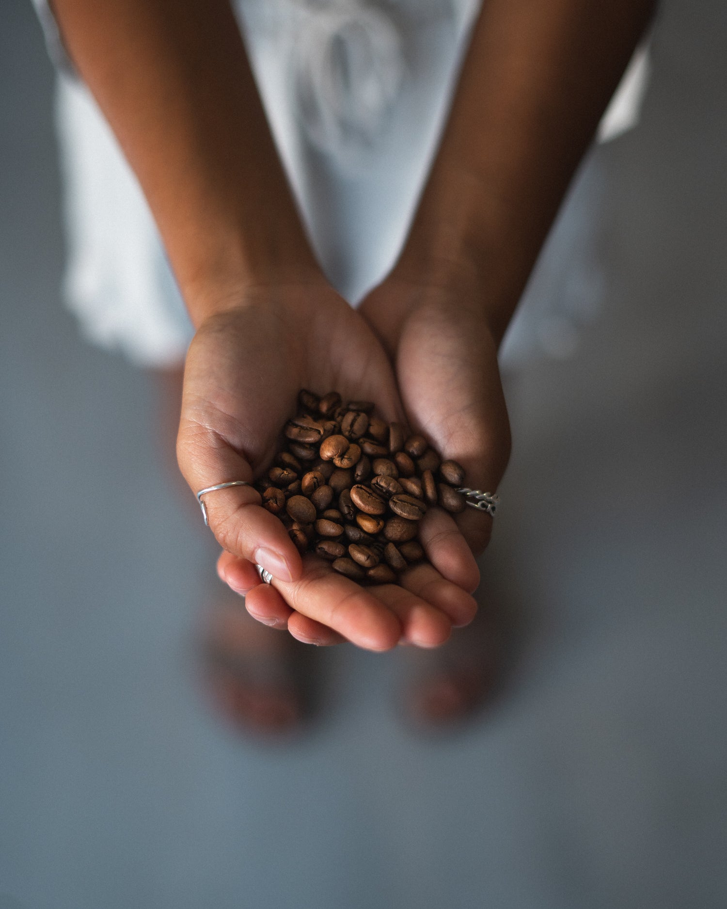 Coffee Beans In Hand